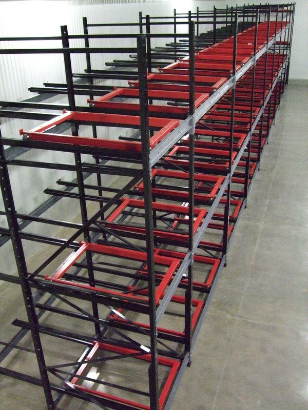 Push back pallet rack carts and rails